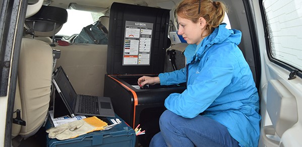 Abi prints a fetoscope in the back of a vehicle for a health post in an internally displaced persons (IDP) camp in Nepal.