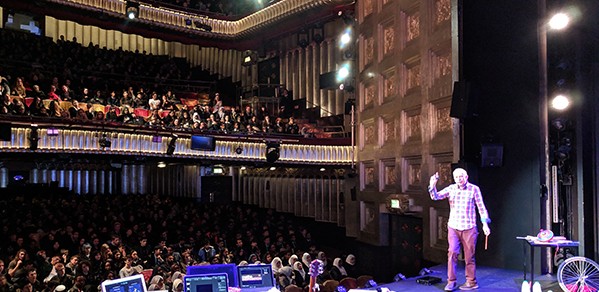 Dr Hunt takes to the stage at The Savoy Theatre in London. 