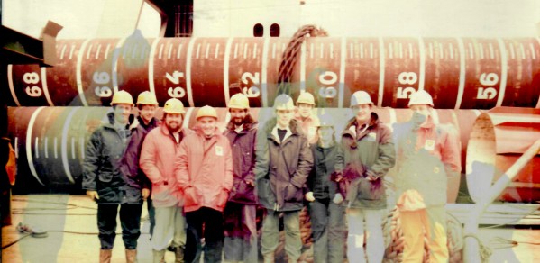 Alumna Helen Morton (third from right) BP civil engineer and colleagues working alongside the Magnus oil platform 1985
