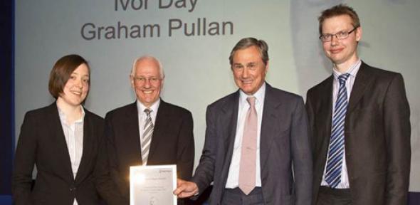 The prizewinners receiving their award from Sir Simon Robertson, Chairman, Rolls-Royce. From left: Dr Anna Young, Dr Ivor Day, Sir Simon Robertson and Dr Graham Pullan