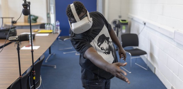 Participant with access needs performs usability testing in Virtual Reality