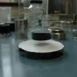 A bulk superconductor levitated by a permanent magnet 