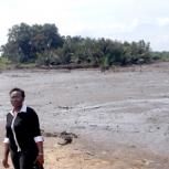 Funmi, at a location in the Niger Delta area, taken last summer when collecting soil samples for laboratory testing