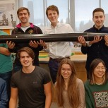 Some of the CU Spaceflight team with the Aquila rocket, a subproject of the Griffin I launch attempt