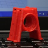 Stretcher bar casing alongside a 3D printed scale model