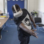 Participant with access needs performs usability testing in Virtual Reality