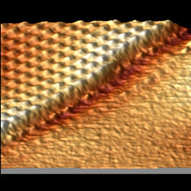 Layers of graphite overlap giving a superlattice structure, around 100nm x 100nm, the height scale is around 0.6nm. 