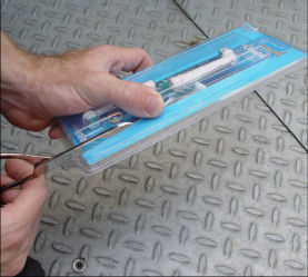 Many consumer products require a capability level that exceeds that of a large proportion of the population. In many cases requiring such a high capability demand is unnecessary, and results in many people being excluded from using the product, and many more being extremely frustrated. The photos show a user attempting to open plastic welded security packaging, which requires extremely high strength and dexterity over a sustained period to cut with scissors, so the user tried more drastic measures (image below).