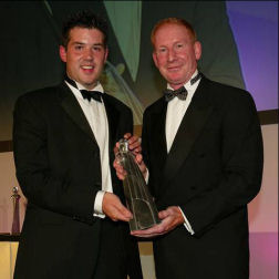 Russ MacMillan (left) receiving his award