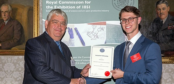 Bernard Taylor, Chairman of the Royal Commission for the Exhibition of 1851, presents PhD student George Roberts with his three-year Industrial Fellowship
