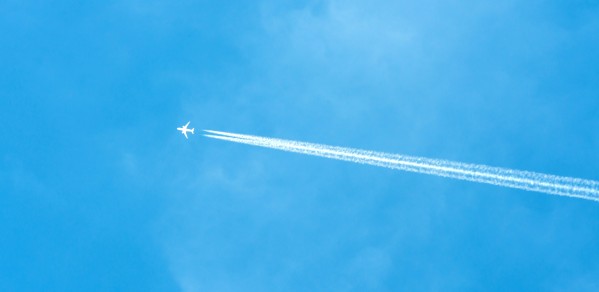 Contrails against a blue sky