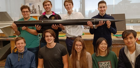 Some of the CU Spaceflight team with the Aquila rocket, a subproject of the Griffin I launch attempt