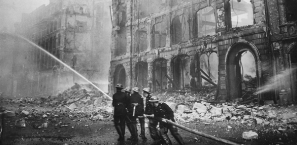 Firefighters putting out a blaze in London after an air raid during The Blitz in 1941.