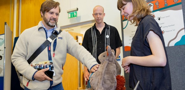 Zenzy, a cuddly robotic creature designed specifically for autistic children being demonstrated.