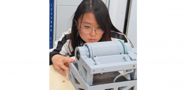 Changyue inspecting the Powerdrop Compact