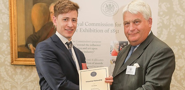 Bernard Taylor, Chairman of the Royal Commission for the Exhibition of 1851, presents PhD student Robert Rouse with his Industrial Fellowship