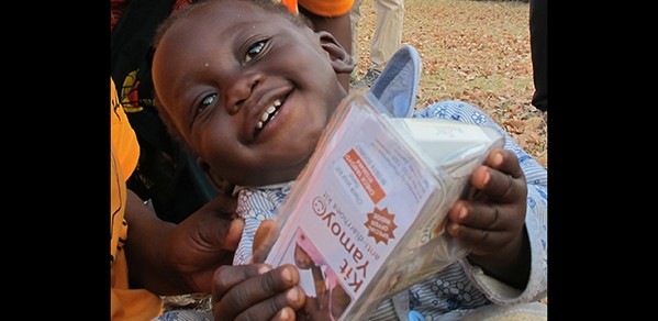 Baby with an anti-diarrhoea kit in Katete, Eastern Province, Zambia.