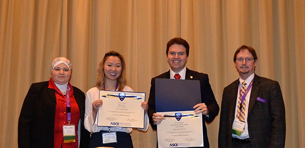 Dr Bella Nguyen & Dr Ioannis Brilakis (centre) receive the John O. Bickel Award from Marwa Hassan, Construction Research Congress (CRC) 2018 President, & Charles W. Berryman, CRC 2018 Conference Chair