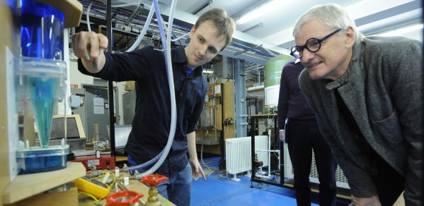 James Dyson with a student during a visit to the Department of Engineering