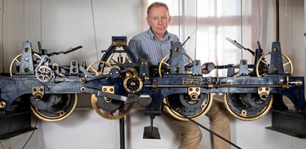 Dr Hugh Hunt with the Trinity College Clock.