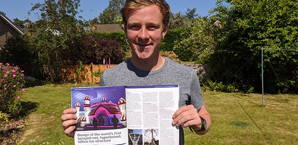 Cam Millar with a copy of his award-winning paper that was published in The Structural Engineer.