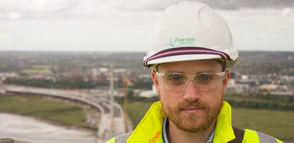 Johannes Whittam on the top of the South Pylon on the Mersey Gateway Bridge.