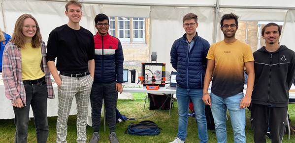 CCES President Aditya Jain (second right) and Vice President Ben Zandonati (second left) pictured with fellow undergraduate engineers at the Christ’s Freshers' Fair.