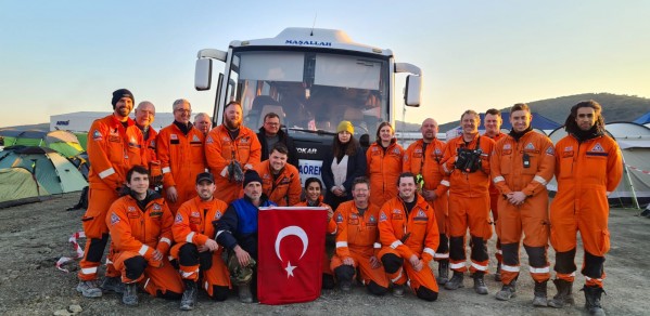 The SARAID team in Turkey - Sakthy centre holding flag