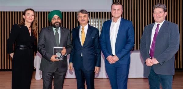 At the Jaguar Land Rover (JLR) awards ceremony, from left, Helen McLintock (JLR Exec); Harpreet Singh (MATSA Team); Prof Sir Ralph Speth (JLR CEO); Arber Shabani (MATSA Team); Andrew Foster (JLR Exec)