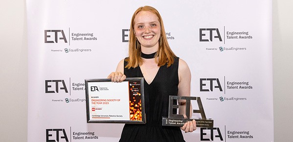 Kate Lucas, Cambridge University Robotics (CUR) society Co-President External, accepts the Engineering Society of the Year 2023 award on behalf of CUR.