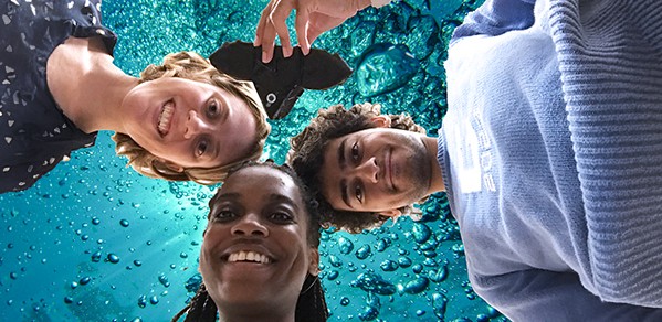 Pictured with their 'Robot Fish', from left, Clare Heinbaugh, Sedinam Simpson and Akshay Choudhry.