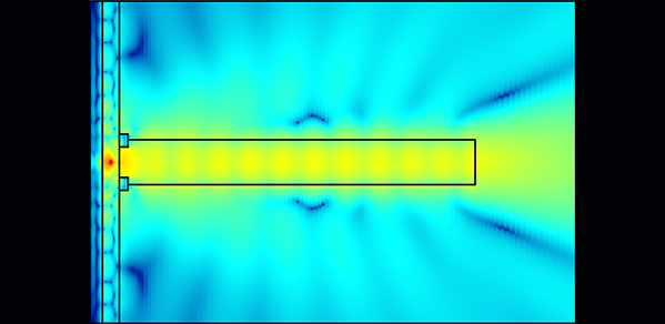 A polymer nanowire deposited on a metallic ring guides the single photons emitted by a quantum light source (red) towards an optical fibre: in this way, the collection efficiency of light is optimised