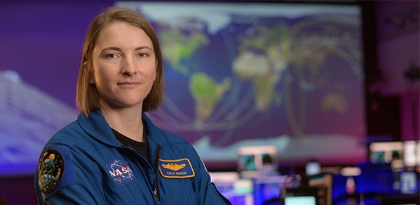 NASA astronaut Kayla Barron in the Blue Flight Control Room at NASA’s Johnson Space Center in Houston.
