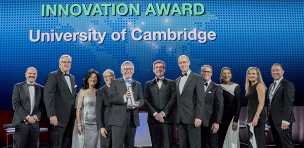 Collecting the Boeing Innovation Award on behalf of the University of Cambridge: Professor Bill O'Neill (holding the Award), Dr John Durrell (centre), and Philip Guildford (centre, right).