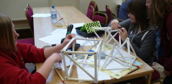 Cromwell Community College students build a truss bridge