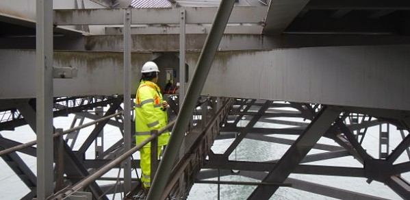 Yu Jia installing the energy harvester at the Forth Road Bridge