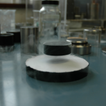 A bulk superconductor levitated by a permanent magnet