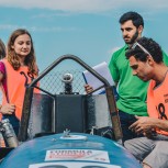Engineering students working on a Full Bull racing car