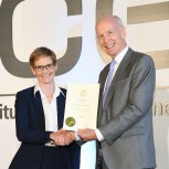 Professor Janet Lees receives her fellowship certificate from ICE President Professor Lord Robert Mair