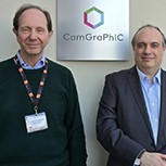 CamGraPhIC co-founders Dr Marco Romagnoli and Professor Andrea Ferrari seen standing in front of a wall with the logo on it