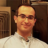 Dr Bakhit holding a test probe next to an artist's illustration of JUICE on its journey towards Jupiter
