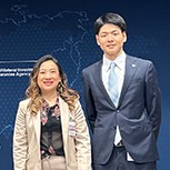 Team CoolidGe.Cambridge MBA candidate Daisuke Nishizawa and MPhil ESD students Jocelin Wijaya and Ryuta Kuniyoshi on stage.