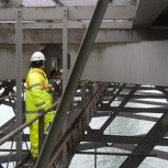 Yu Jia installing the energy harvester at the Forth Road Bridge