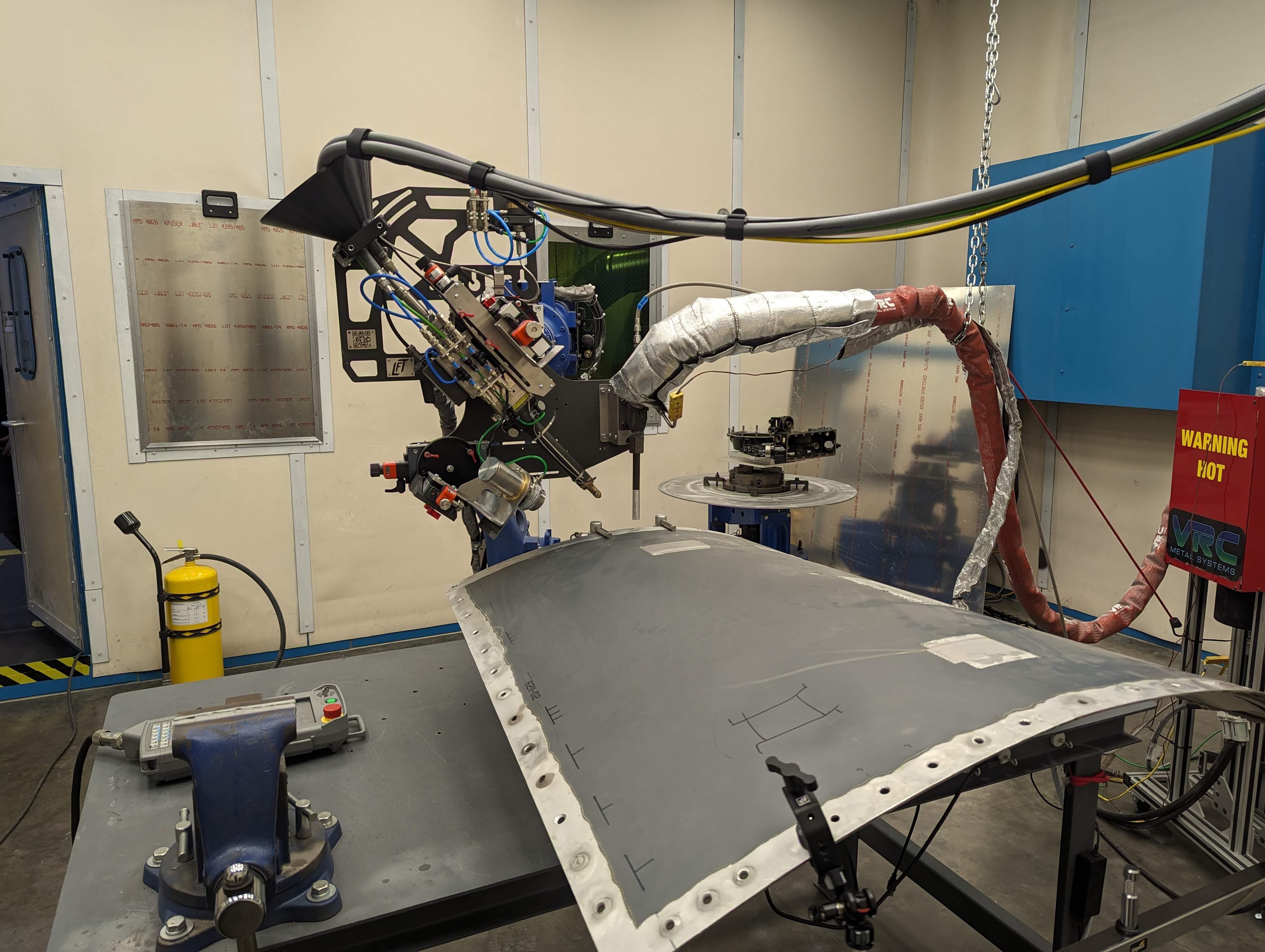 LACS equipment set-up to add a coating to repair a panel aircraft wing