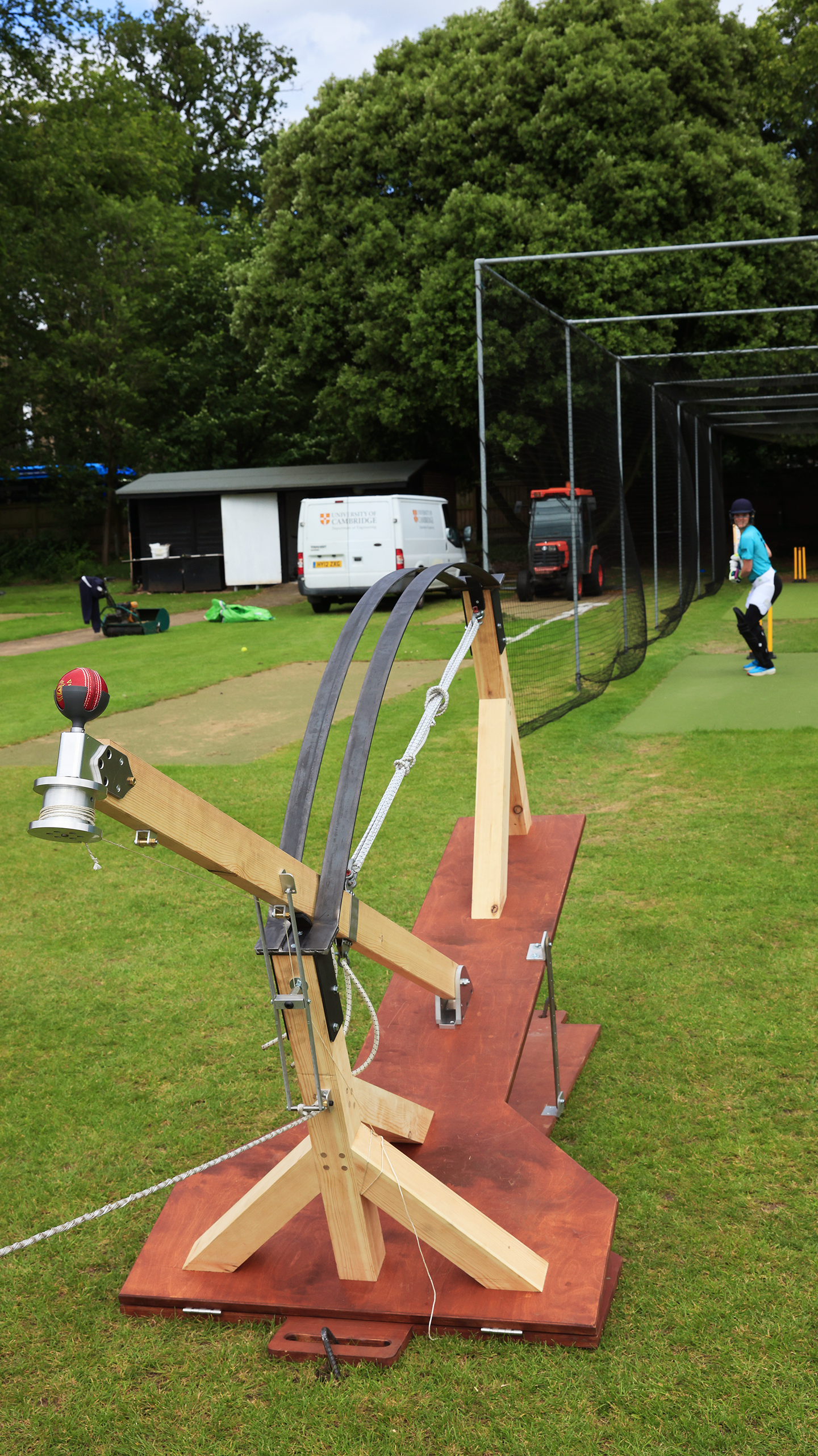 CUCC's Alice Bebb takes a ball from the Venn bowling machine